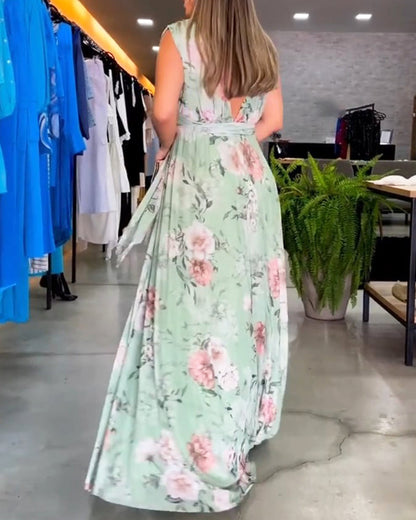 Gia - Robe longue sans manches à fleurs avec fente