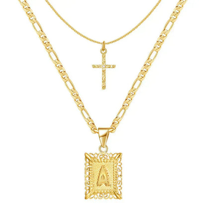 Collier avec croix et initiale | Or