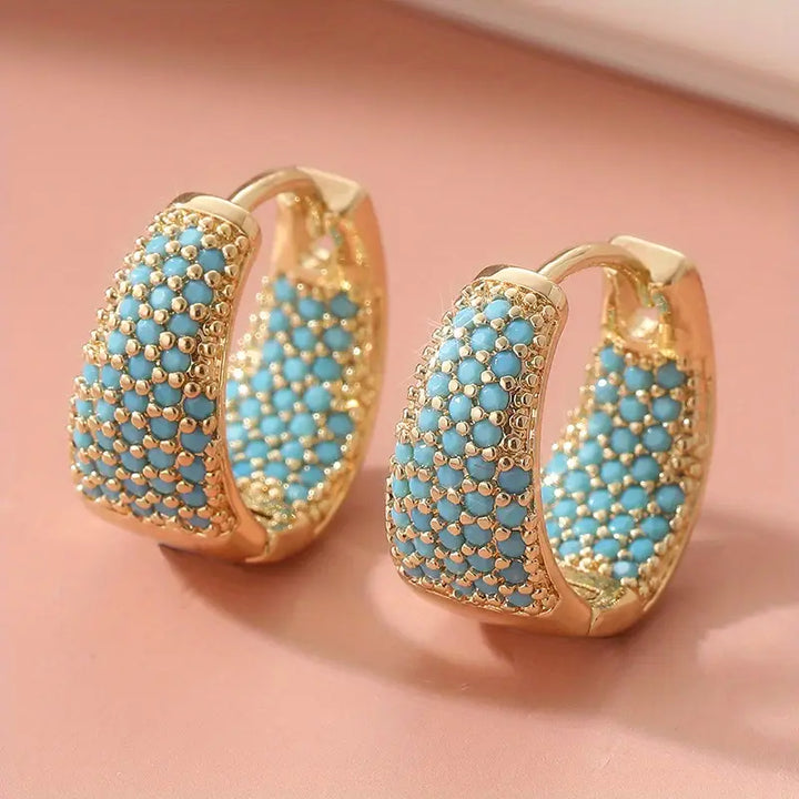 Boucles d'oreilles créoles en perles turquoise avec finition dorée