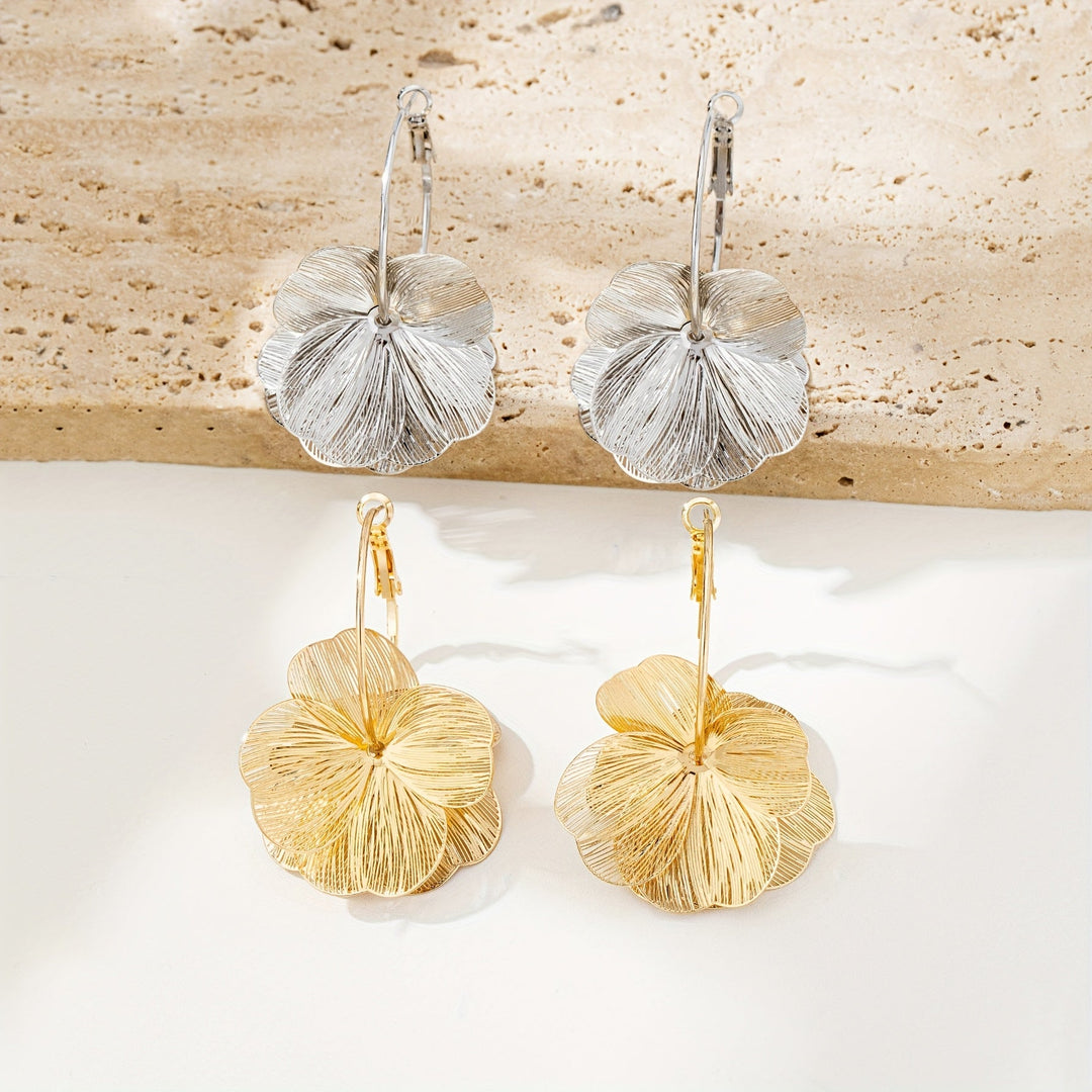 Boucles d'oreilles creuses en or exagérées