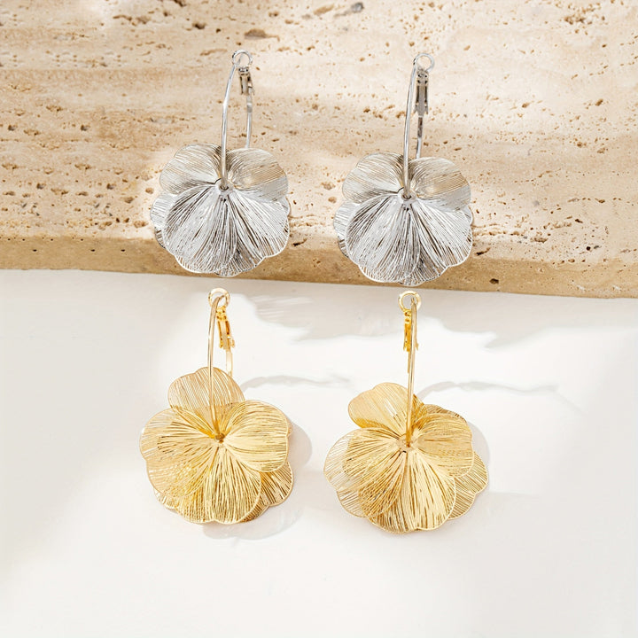 Boucles d'oreilles creuses en or exagérées
