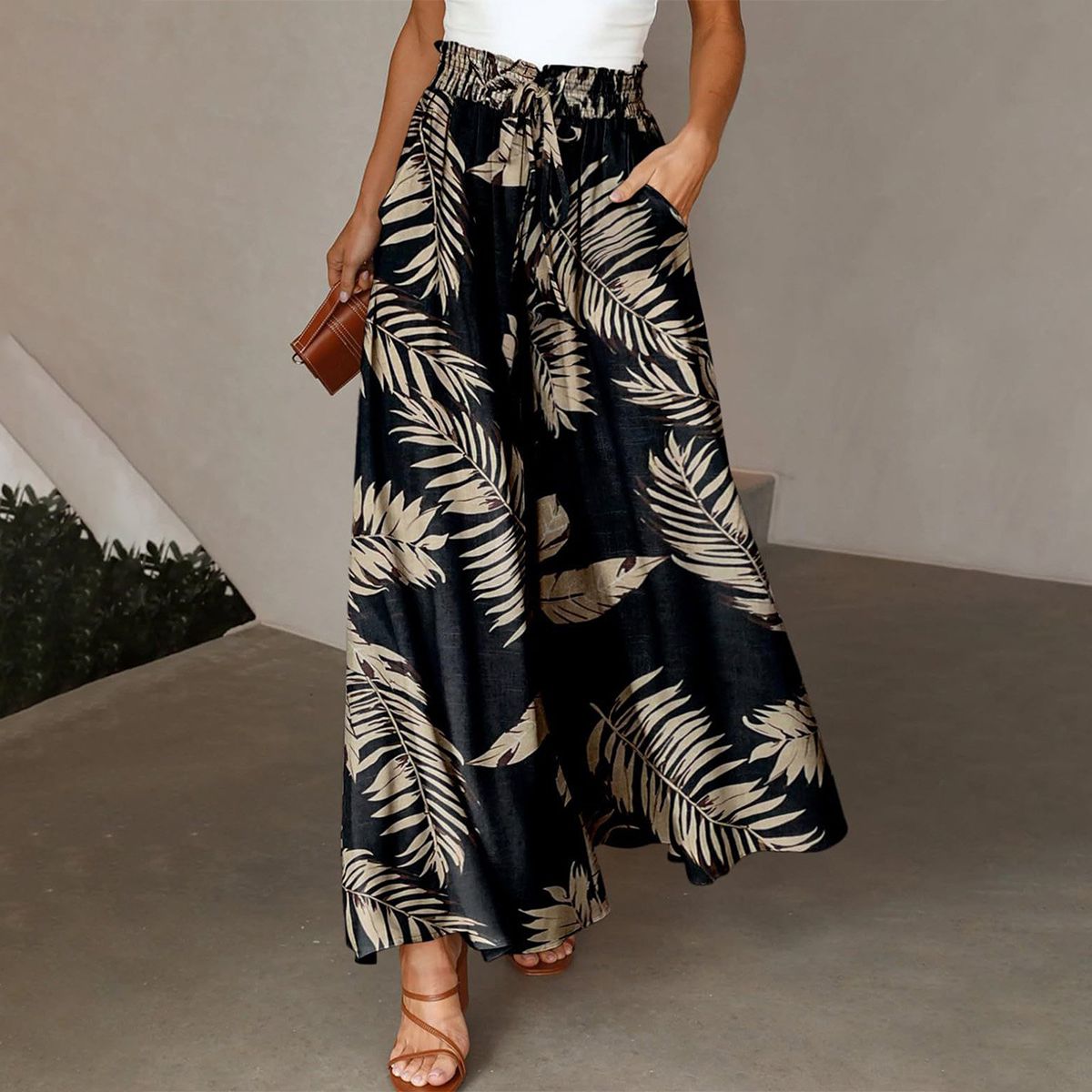 Pantalon populaire à poches latérales et imprimé végétal
