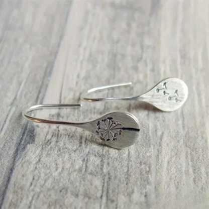 Boucles d'oreilles en argent finement travaillées en forme de feuille de pissenlit