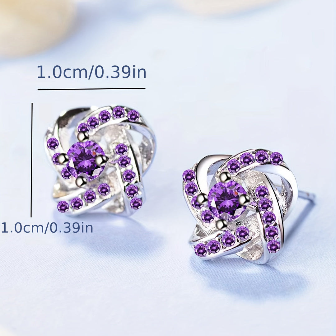 Boucles d'oreilles en trèfle à quatre feuilles violet