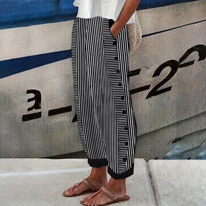Pantalon noir à rayures et poches latérales