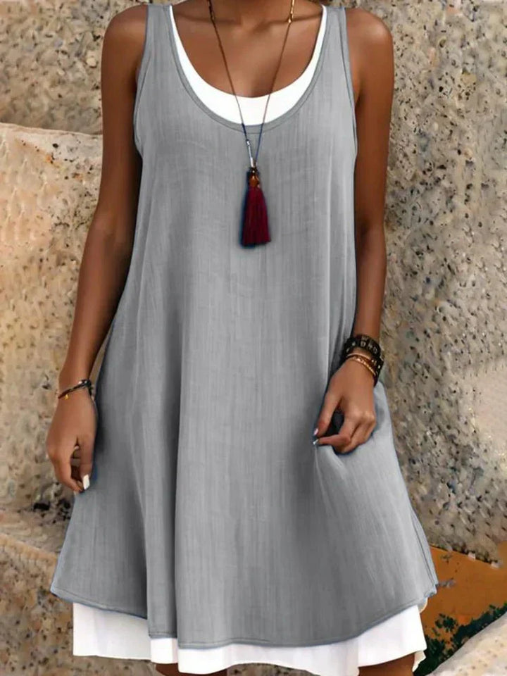 Cove | Robe Midi Sans Manches Ensoleillée
