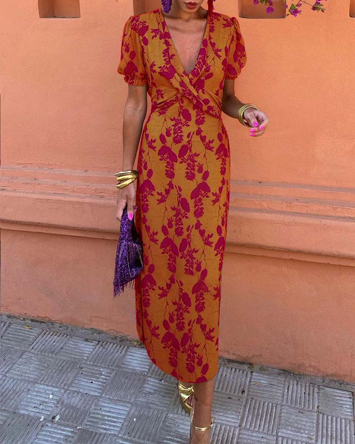 Angelina - Robe midi impressionnante avec décolleté en V
