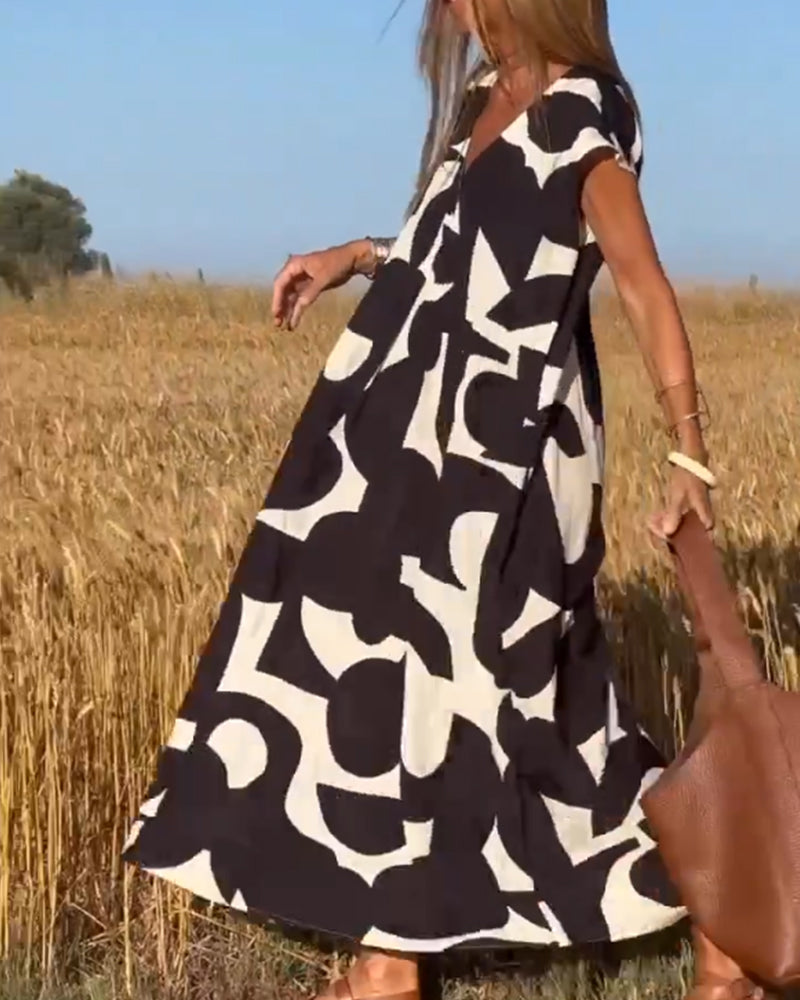 SITA - Robe à imprimé et décolleté en V