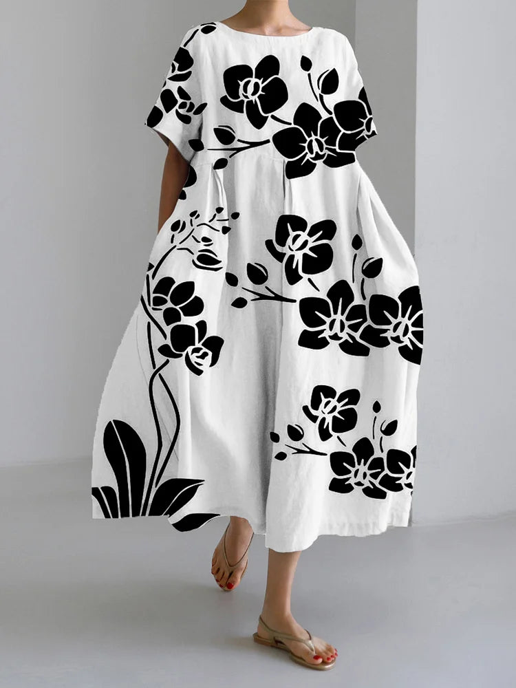 Cassidy - Robe Fleurie Noire Fluide et Intemporelle