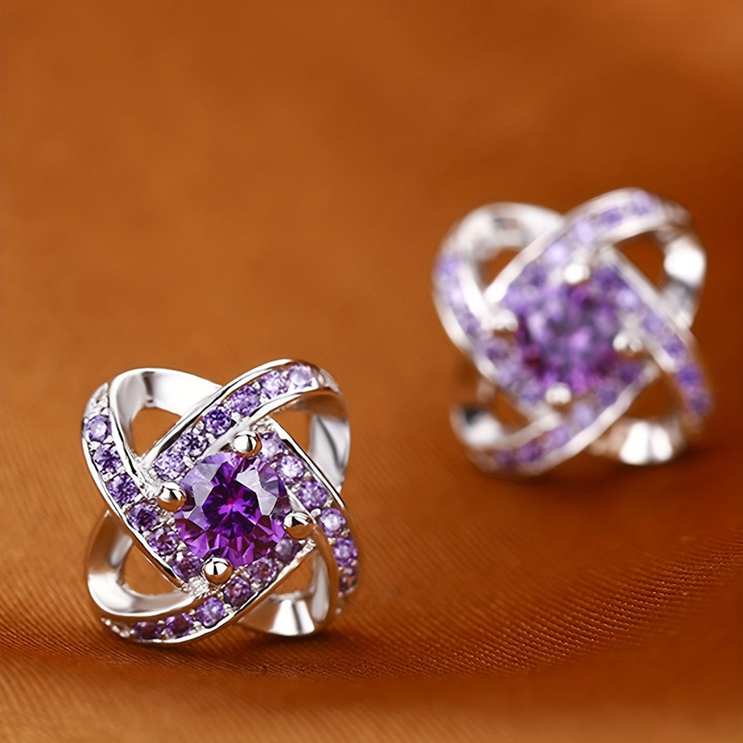Boucles d'oreilles en trèfle à quatre feuilles violet