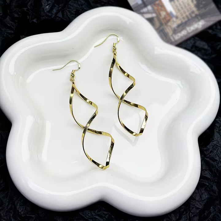 Boucles d'oreilles pendantes en spirale | Or