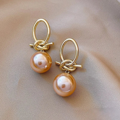 Boucles d'oreilles en or avec perle