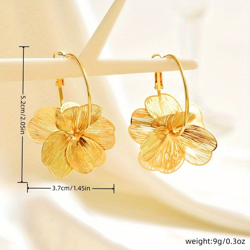 Boucles d'oreilles creuses en or exagérées