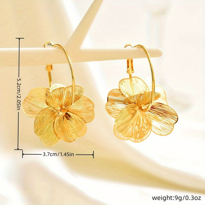 Boucles d'oreilles creuses en or exagérées