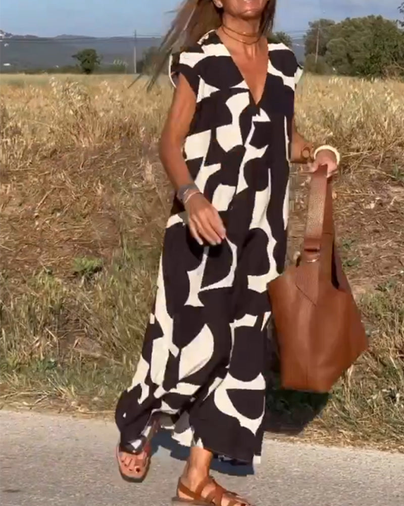 SITA - Robe à imprimé et décolleté en V