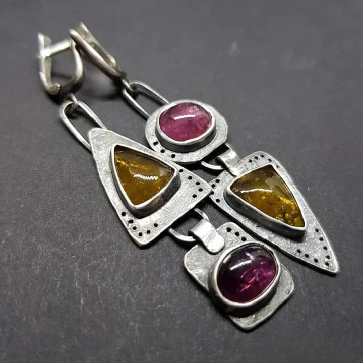 Boucles d'oreilles géométriques en triangle intemporel