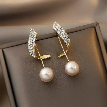 Boucles d'oreilles en or avec perle