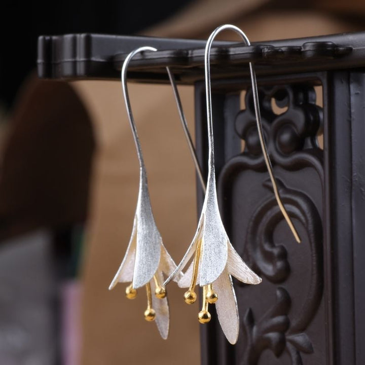 Boucles d'oreilles élégantes en argent avec fleurs