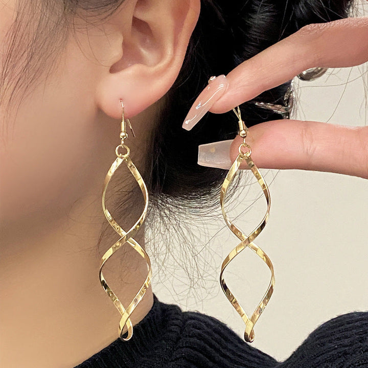 Boucles d'oreilles pendantes en spirale | Or