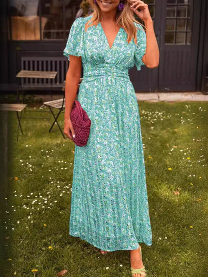 Élina – Robe longue fluide avec motifs floraux