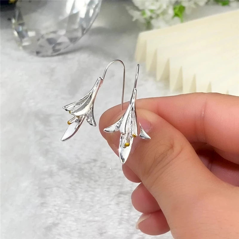 Boucles d'oreilles élégantes en argent avec fleurs