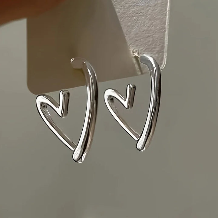 Boucles d'oreilles élégantes en or rose en forme de cœur