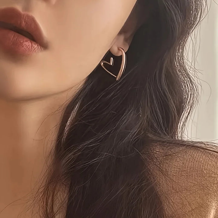 Boucles d'oreilles élégantes en or rose en forme de cœur