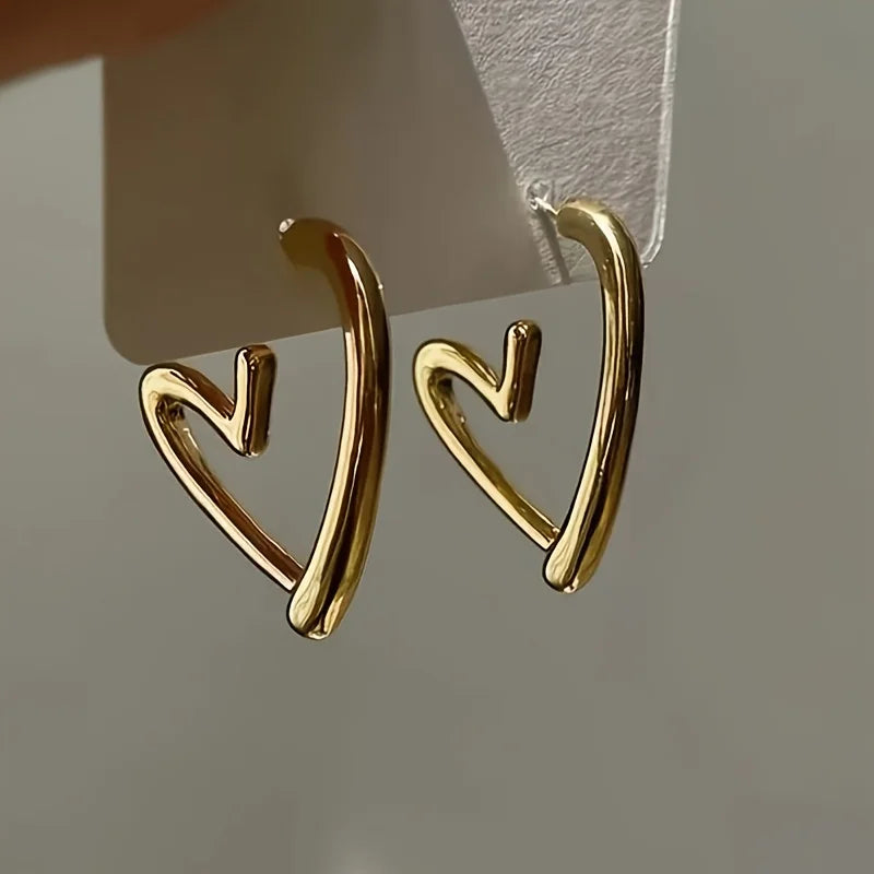 Boucles d'oreilles élégantes en or rose en forme de cœur