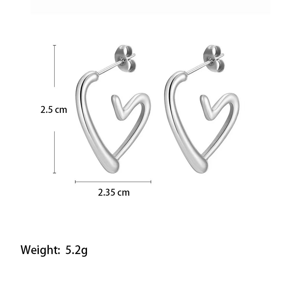 Boucles d'oreilles élégantes en or rose en forme de cœur