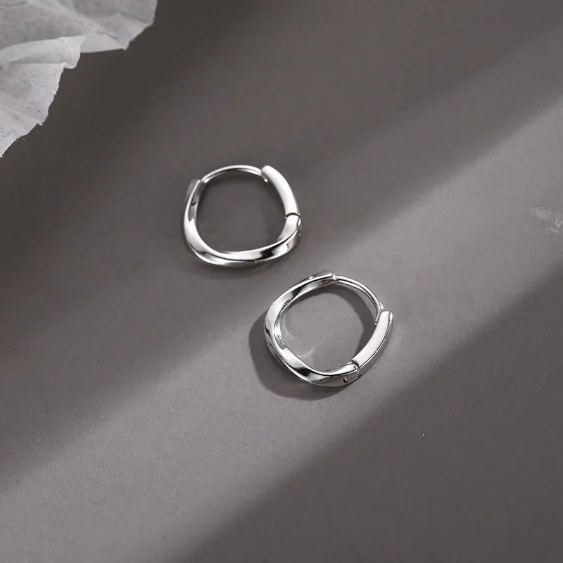 Boucles d'oreilles rondes en argent sterling incrustées