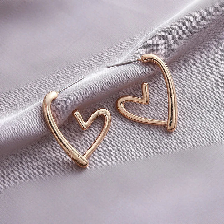Boucles d'oreilles élégantes en or rose en forme de cœur