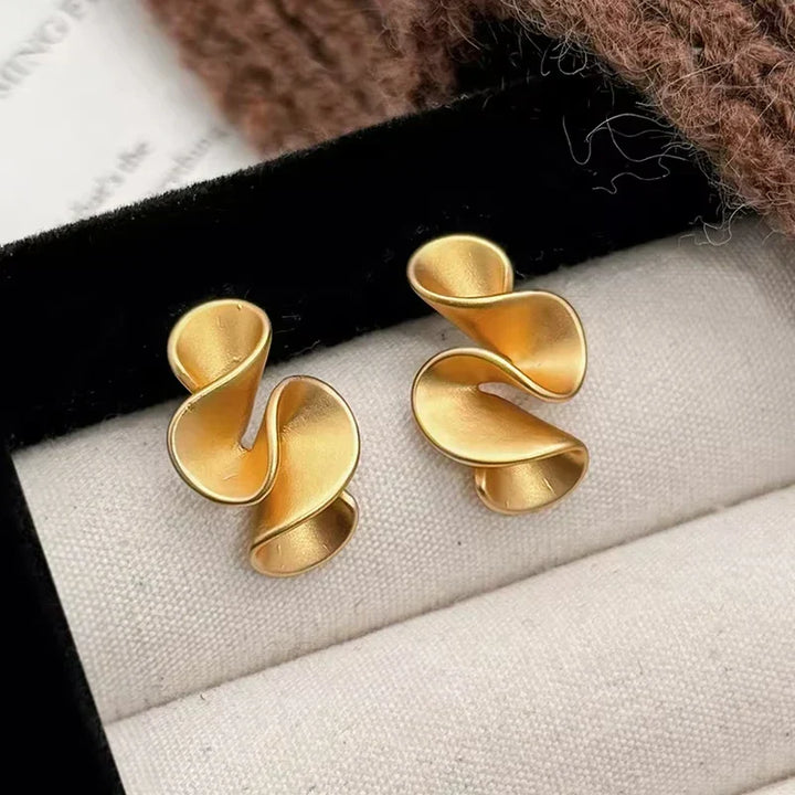 Boucles d'oreilles en argent sterling et or 18K en forme de fleur