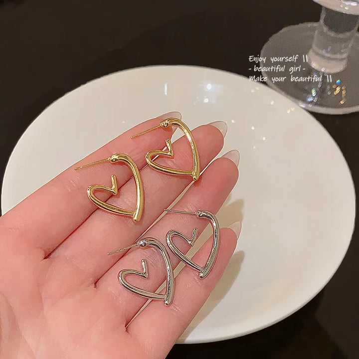 Boucles d'oreilles élégantes en or rose en forme de cœur