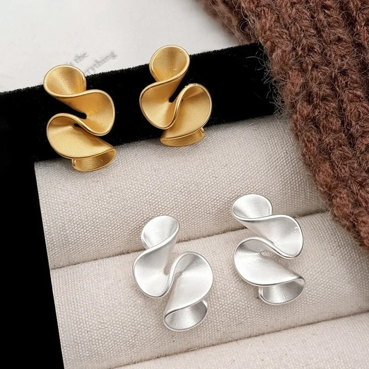 Boucles d'oreilles en argent sterling et or 18K en forme de fleur