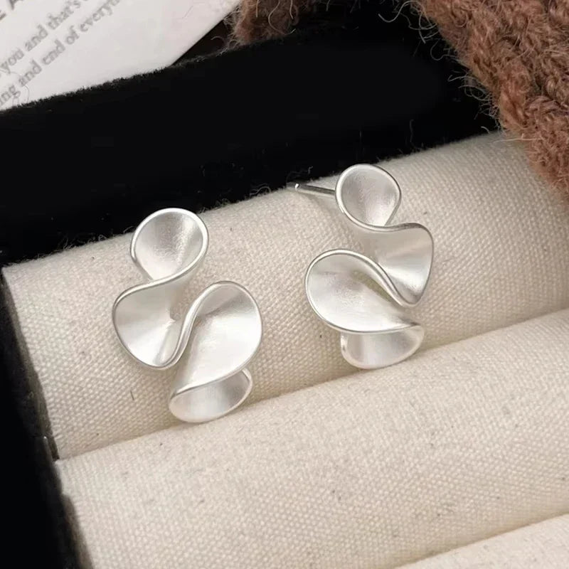 Boucles d'oreilles en argent sterling et or 18K en forme de fleur