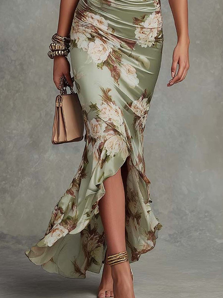 Anna - Robe longue asymétrique en satin vert avec décolleté en V, manches évasées froncées et motif floral