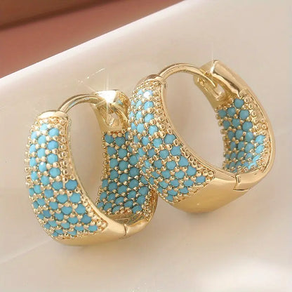 Boucles d'oreilles créoles en perles turquoise avec finition dorée