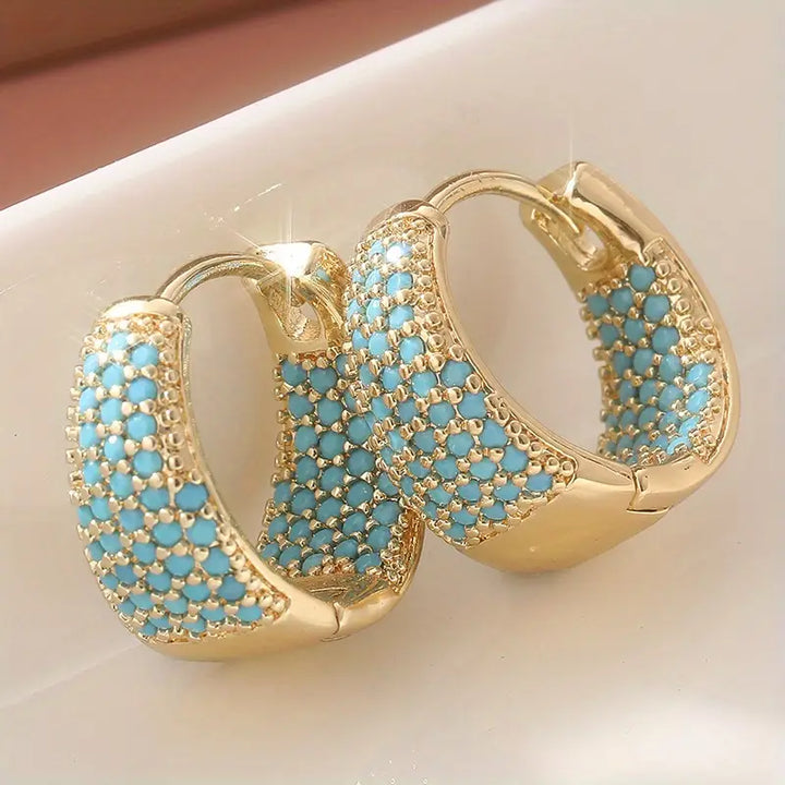Boucles d'oreilles créoles en perles turquoise avec finition dorée