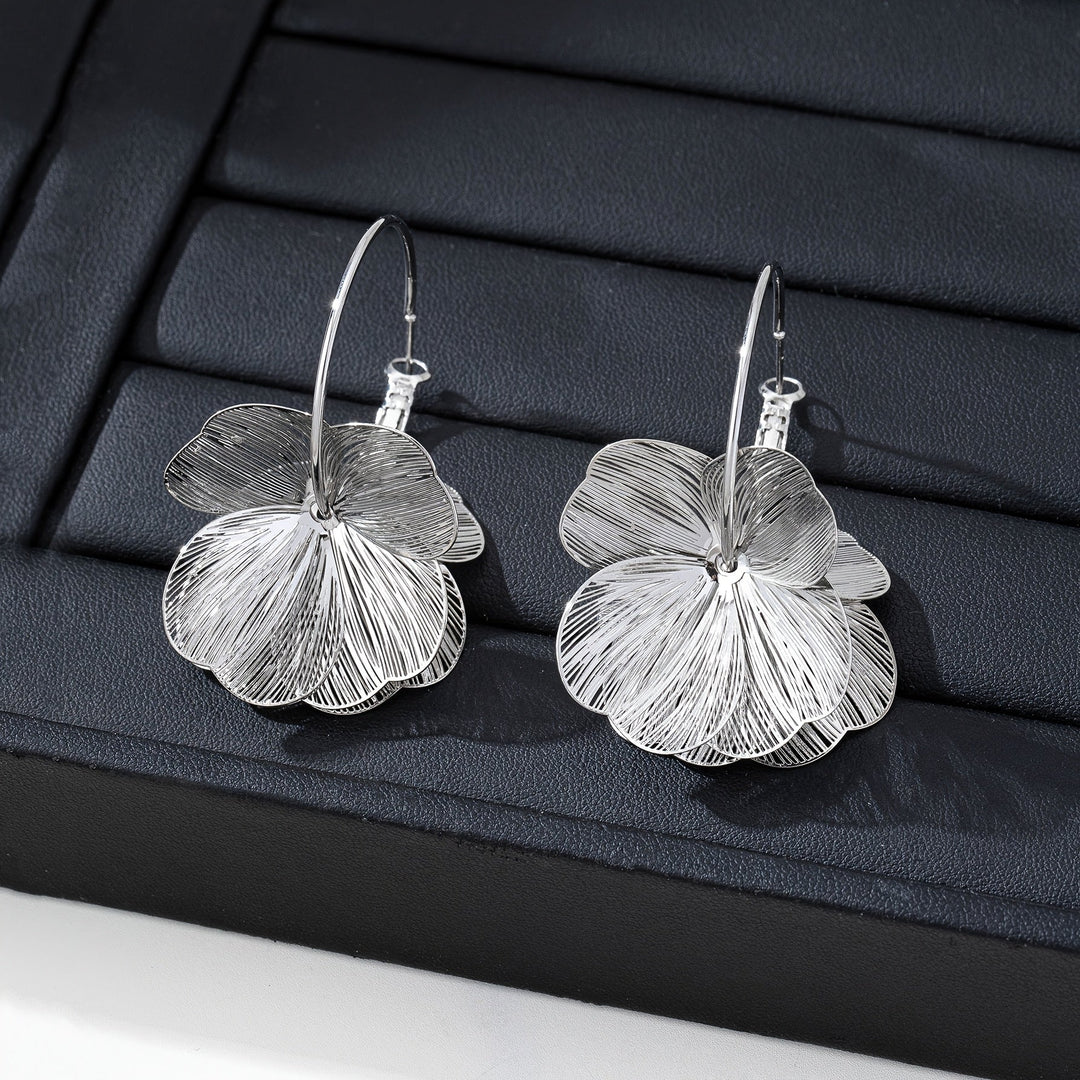 Boucles d'oreilles creuses en or exagérées