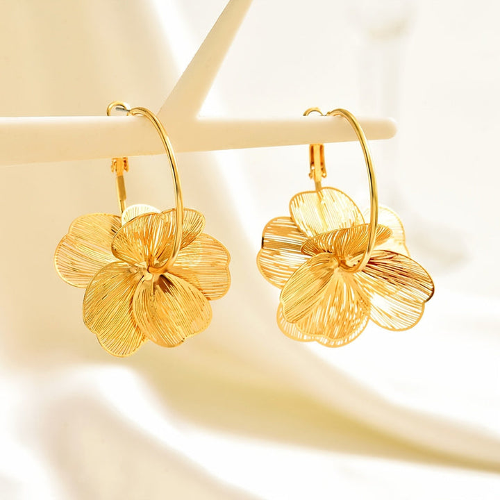 Boucles d'oreilles creuses en or exagérées