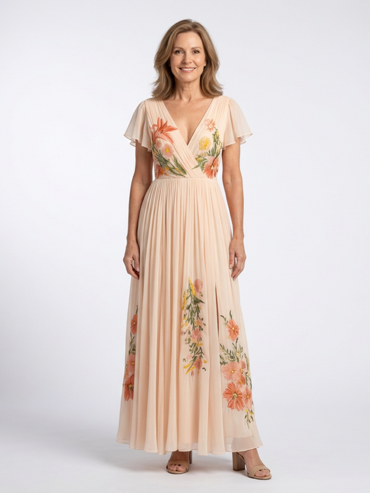 Calista | Robe maxi plissée à fleurs à col en V et manches courtes