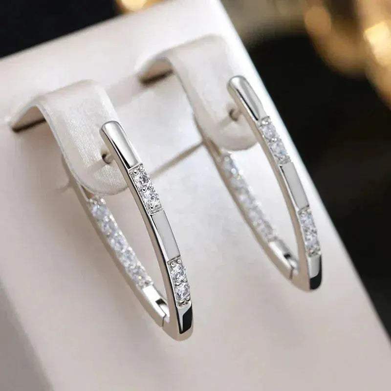 Boucles d'oreilles sophistiquées avec pierres en zircon