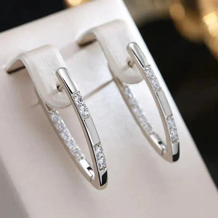 Boucles d'oreilles sophistiquées avec pierres en zircon